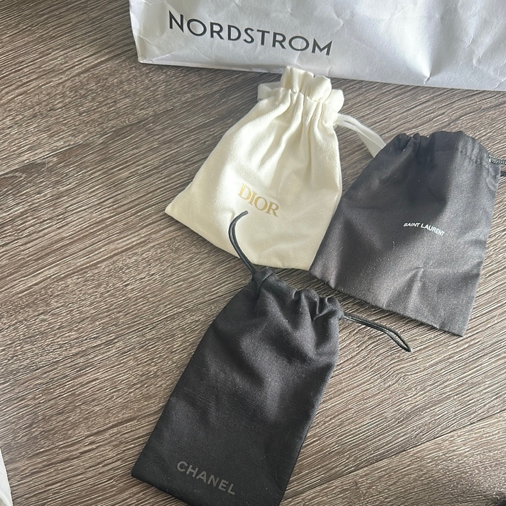 Chanel, Dior, and Saint Laurent Dust Bags